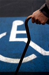 Disabled person with a cane